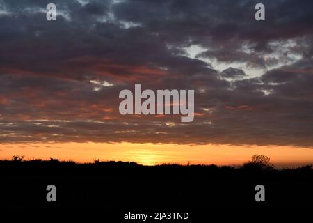 Sunset over Port Issac Cornwall England uk Stock Photo