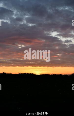 Sunset over Port Issac Cornwall England uk Stock Photo