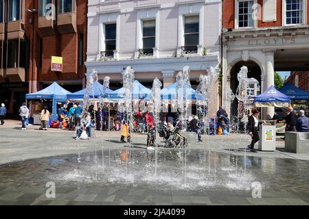 Ipswich, Suffolk, UK - 27 May 2022: Water fountains on the Cornhill.