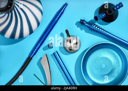 Top view of Hookah parts on light blue background Stock Photo