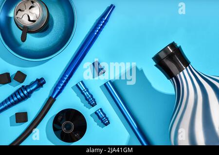 Top view of Hookah parts on light blue background Stock Photo