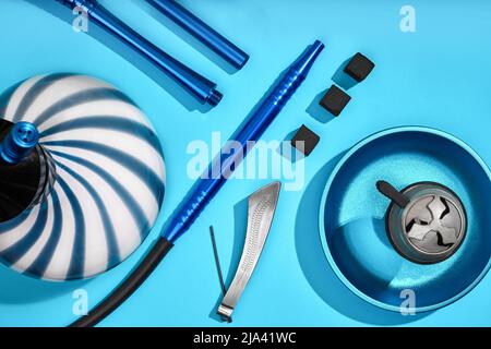 Top view of Hookah parts on light blue background Stock Photo