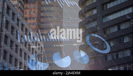 Image of financial graphs and data over cityscape Stock Photo