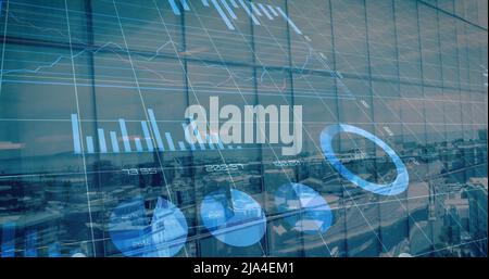 Image of financial graphs and data over cityscape Stock Photo