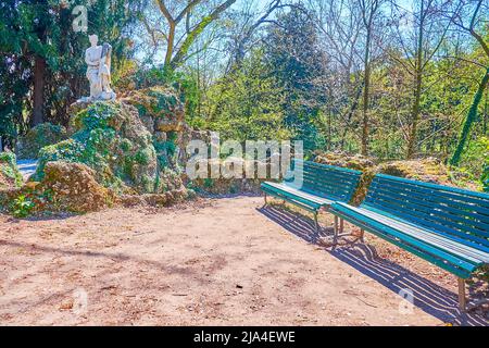 The two benches in Indro Montanelli Public Gardens central park of Milan, Italy Stock Photo