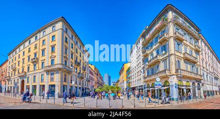 MILAN, ITALY - APRIL 5, 2022: Panorama of the historical buildings along Corso Come street, famous pedestrian street with numerous restaurants and sto Stock Photo