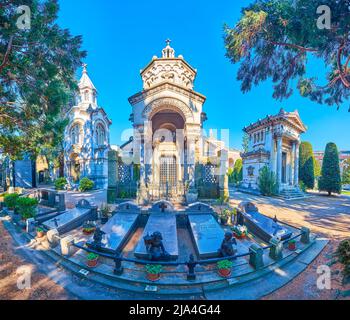 The Monumental Cemetery with large amount of funeral tombs, shrines and graves, Milan, Italy Stock Photo