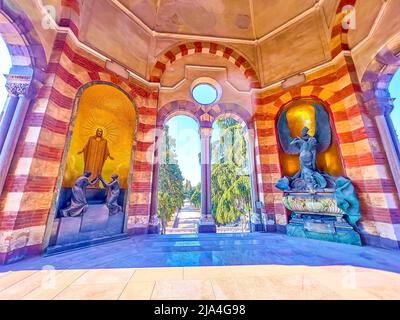 MILAN, ITALY - APRIL 5, 2022: The beautiful decorated loggia of Famedio in Memorial Cemetery, on April 5 in Milan, Italy Stock Photo