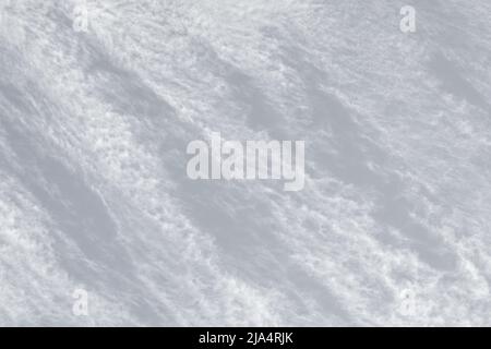 Blurred abstract gray white background. White cirrus clouds. Interesting background of blurry clouds. Stock Photo