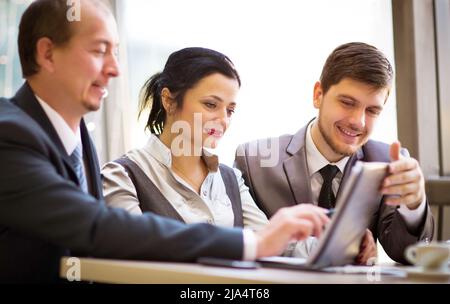 Business team working together to achieve better results Stock Photo