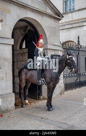 London, UK- May 3, 2022: The Life Guards on horseback outside Horse Guards Parade in London Stock Photo