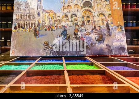 Natural colour pigments with a painting in a shop display. Venice, Italy, Stock Photo
