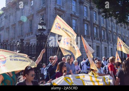 London, UK. 27th May 2022. Cleaners and supporters gathered outside Downing Street demanding justice for Whitehall cleaner Emanuel Gomes, who died from covid while parties were held at Downing Street, and in protest against 'disrespect' towards cleaners. Credit: Vuk Valcic/Alamy Live News