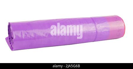 Purple garbage bag roll plastic isolated on white background Stock Photo