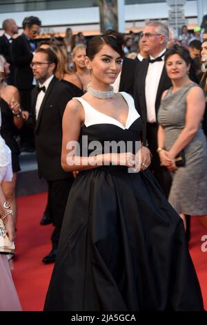 Cannes, France. 27th May, 2022. 75th Cannes film festival 2022, Red carpet fim 'Mascarade' . Pictured: Guest Credit: Independent Photo Agency/Alamy Live News Stock Photo