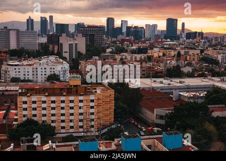 A dramatic and fiery sunset over the skyline of Mexico City, Mexico Stock Photo