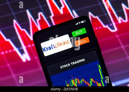 In this photo illustration the stock trading graph of Kraft Heinz Company seen on a smartphone screen. Stock Photo