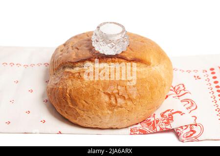 https://l450v.alamy.com/450v/2ja6arx/bread-with-salt-is-a-traditional-symbol-of-hospitality-round-bread-with-salt-shaker-on-top-2ja6arx.jpg
