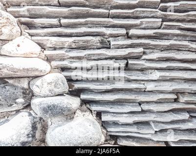 Decor stone brick wall texture, siding horizontal diagonal lines different sized shapes. Beautiful nature wallpaper. Romantic simple. Abstract grunge Stock Photo