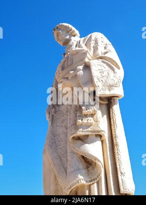 Statue of Sao Vicente or Saint Vincent in Lisbon isolated with blue sky Stock Photo