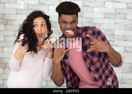 overjoyed excited couple celebrates win enjoy victory rejoice success Stock Photo