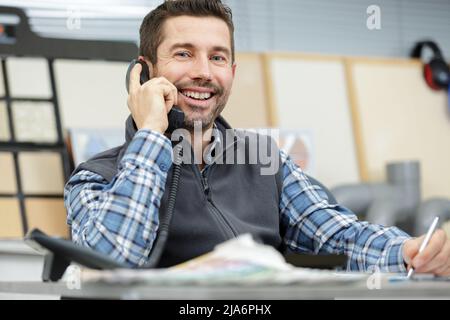a happy customer on the phone Stock Photo