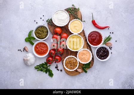 Set of different sauces. Ketchup, mustard and mayonnaise Stock Photo