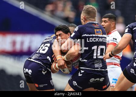London, UK. 28th May, 2022. Taealoaloa Amone #13 of Leigh Centurions is tackled by Junior Moors #16 of Featherstone Rovers in London, United Kingdom on 5/28/2022. (Photo by Mark Cosgrove/News Images/Sipa USA) Credit: Sipa USA/Alamy Live News Stock Photo