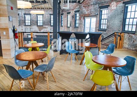Coworking office space seating area with brick walls Stock Photo