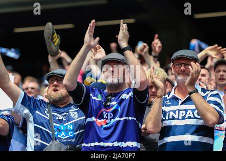 The Featherstone Rovers supporters cheer on their team during the game