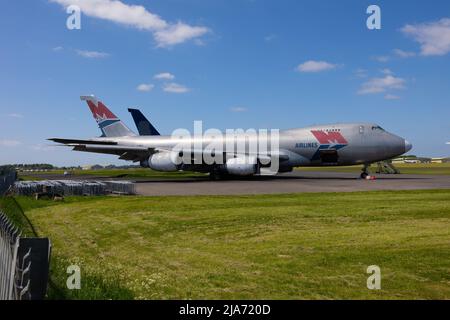 A Selection Of Passenger Planes Which Have Finished .Taking People And Cargo All Around The World Now Being Recycled .At Cotswold Airport In England . Stock Photo