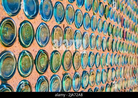 Colorful wall of glass bottles on house in Rhyolite ghost town Stock Photo