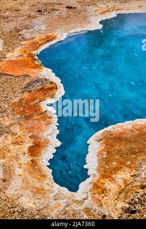 Close-up of vibrant blue deep spring in Yellowstone Stock Photo