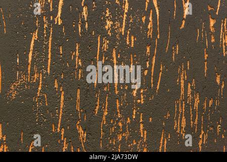 Orange or brown abstract pattern plaster bark beetle stucco texture background. Stock Photo