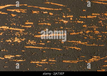 Orange or brown abstract pattern plaster bark beetle stucco texture background. Stock Photo