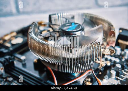 CPU cooler installed on the motherboard close-up Stock Photo