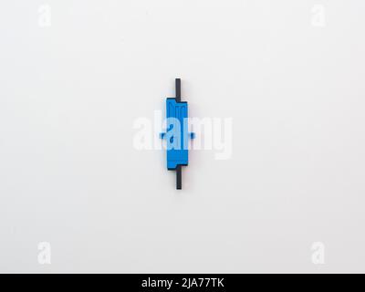 SC-UPC adapter for single mode fiber optic patch cord with flange on isolated white background Stock Photo