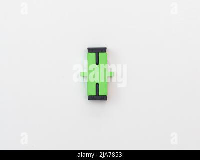SC-UPC adapter for single mode fiber optic patch cord with flange on isolated white background Stock Photo