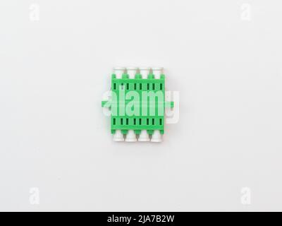 SC-UPC adapter for single mode fiber optic patch cord with flange on isolated white background Stock Photo