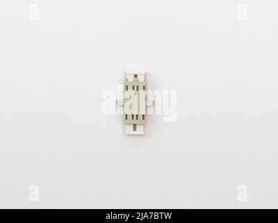 SC-UPC adapter for single mode fiber optic patch cord with flange on isolated white background Stock Photo