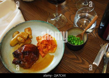 Fine Dining- Overhead close up of a Beef Bourguignon dinner served  in a fine dining restaurant in Chablis, France. Stock Photo