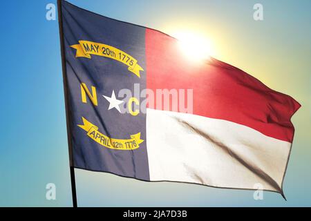The US state flag of North Carolina waving in the wind Stock Photo - Alamy