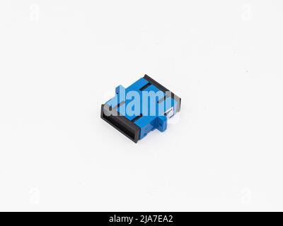 SC-UPC adapter for single mode fiber optic patch cord with flange on isolated white background Stock Photo