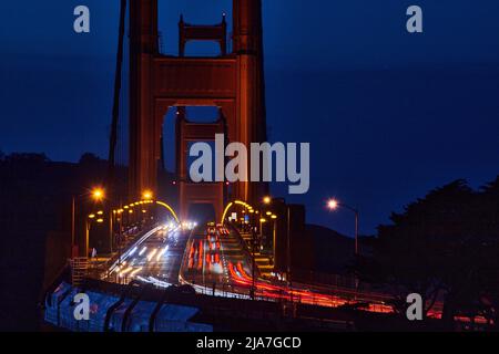 Golden Gate Bridge at night with traffic blurred Stock Photo