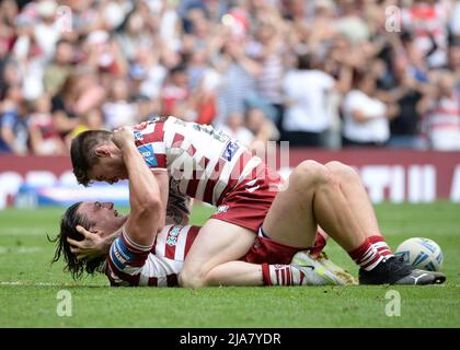 Tottenham Hotspurs Stadium, London, UK. 28th May, 2022. Liam Byrne of Wigan Warriors and John Bateman of Wigan Warriors celebrate at full time 2022 Challenge Cup Final: Huddersfield Giants V Wigan Warriors Venue: Tottenham Hotspur Stadium, England Date: Saturday, 28 May Kick-off: 15:00 BST Credit: Craig Cresswell/Alamy Live News Stock Photo