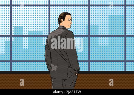 A young man in a businessman suit stands near the window and looks at the city. Stock Vector