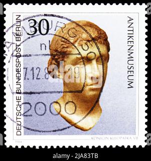 MOSCOW, RUSSIA - MAY 14, 2022: Postage stamp printed in Germany shows Queen Cleopatra VII (Museum of Antiquities), Art treasures in Berlin museums ser Stock Photo