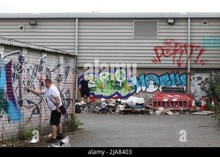 Leicester, Leicestershire, UK. 28th May 2022.  Artists use spray paints during the Bring the Paint event. The award winning International Street Art Festival attracts artists from all over the world. Credit Darren Staples/Alamy Live News. Stock Photo