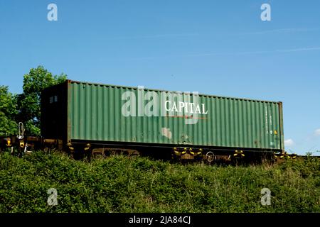 A Capital shipping container on a freightliner train, Warwickshire, UK Stock Photo