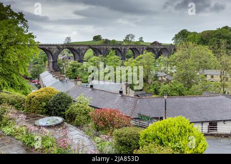 The disused Ingleton railway viaduct crosses the valley of the River Greta in the Yorkshire Dales, North Yorkshire, England Stock Photo